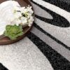 Open book with flowers on abstract rug