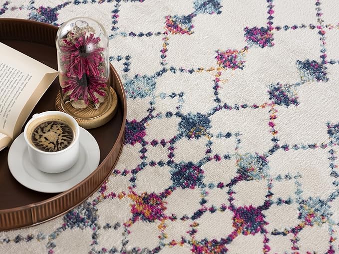 Coffee on tray with floral carpet design.