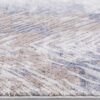Textured rug with beige and gray patterns