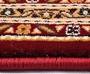 Close-up of decorative red and beige carpet edge