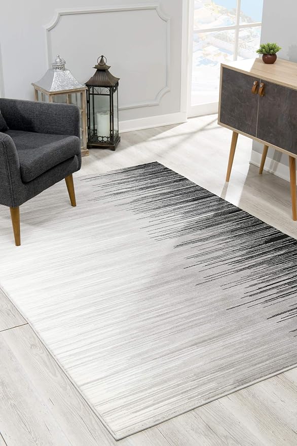 Modern gray gradient rug in stylish living room.