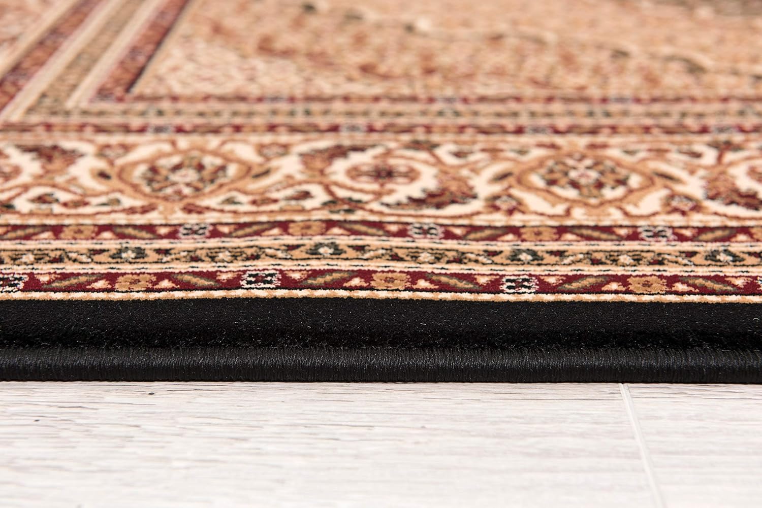 Close-up of decorative carpet on floor