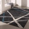 Modern geometric patterned rug in living room.