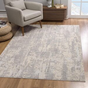 Modern living room with patterned gray area rug.