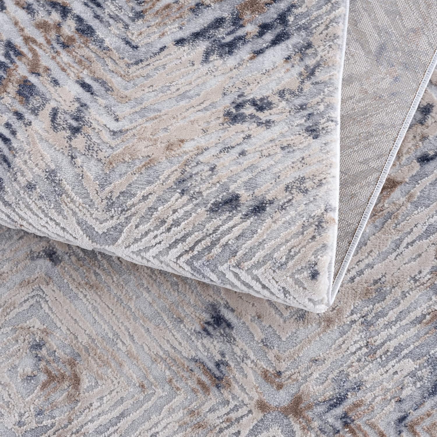 Decorative patterned plush carpet close-up view