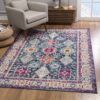 Colorful area rug with ornate geometric patterns.