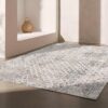 Modern gray rug in a minimalistic room interior.