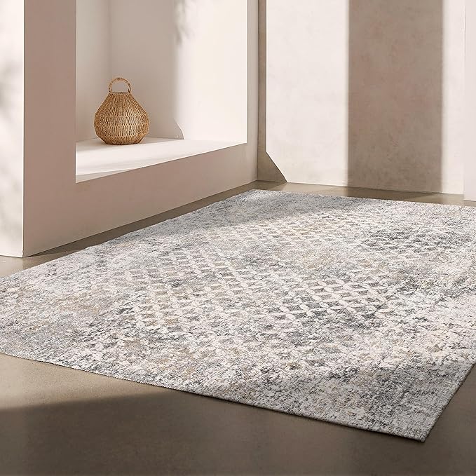 Modern gray rug in a minimalistic room interior.
