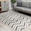 Modern living room with chevron patterned rug.