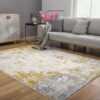 Modern living room with abstract yellow-gray rug