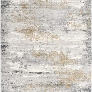Abstract gray and beige distressed area rug.