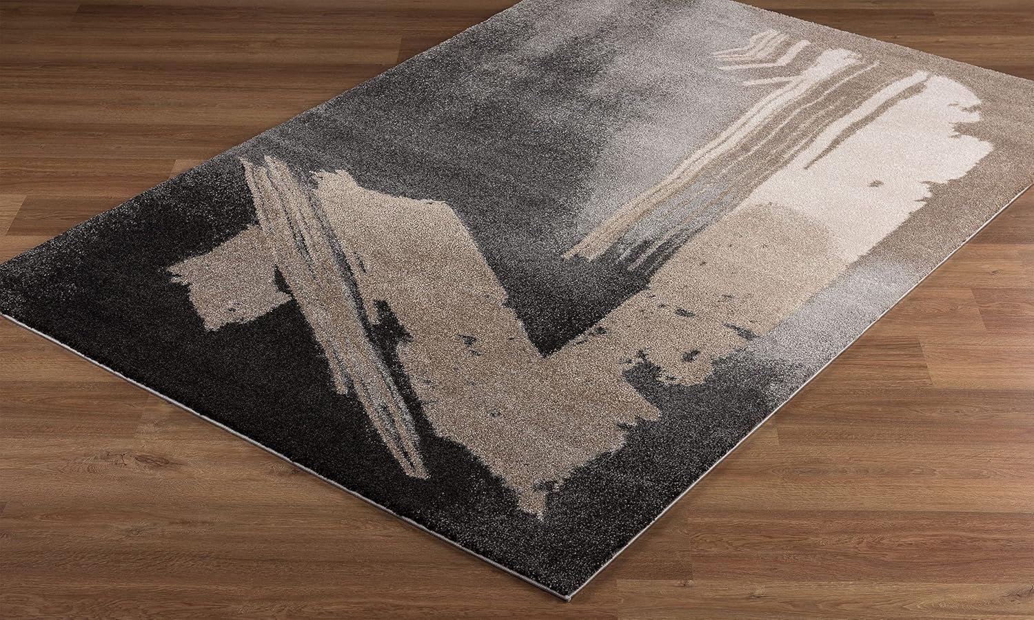 Abstract pattern rug on wooden floor