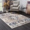 Modern living room with patterned rug and armchair