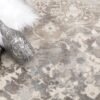 Patterned carpet with decorative bottles and fur accent