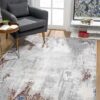 Modern living room with abstract gray rug.