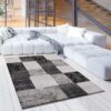 Modern rug in minimalist living room design.
