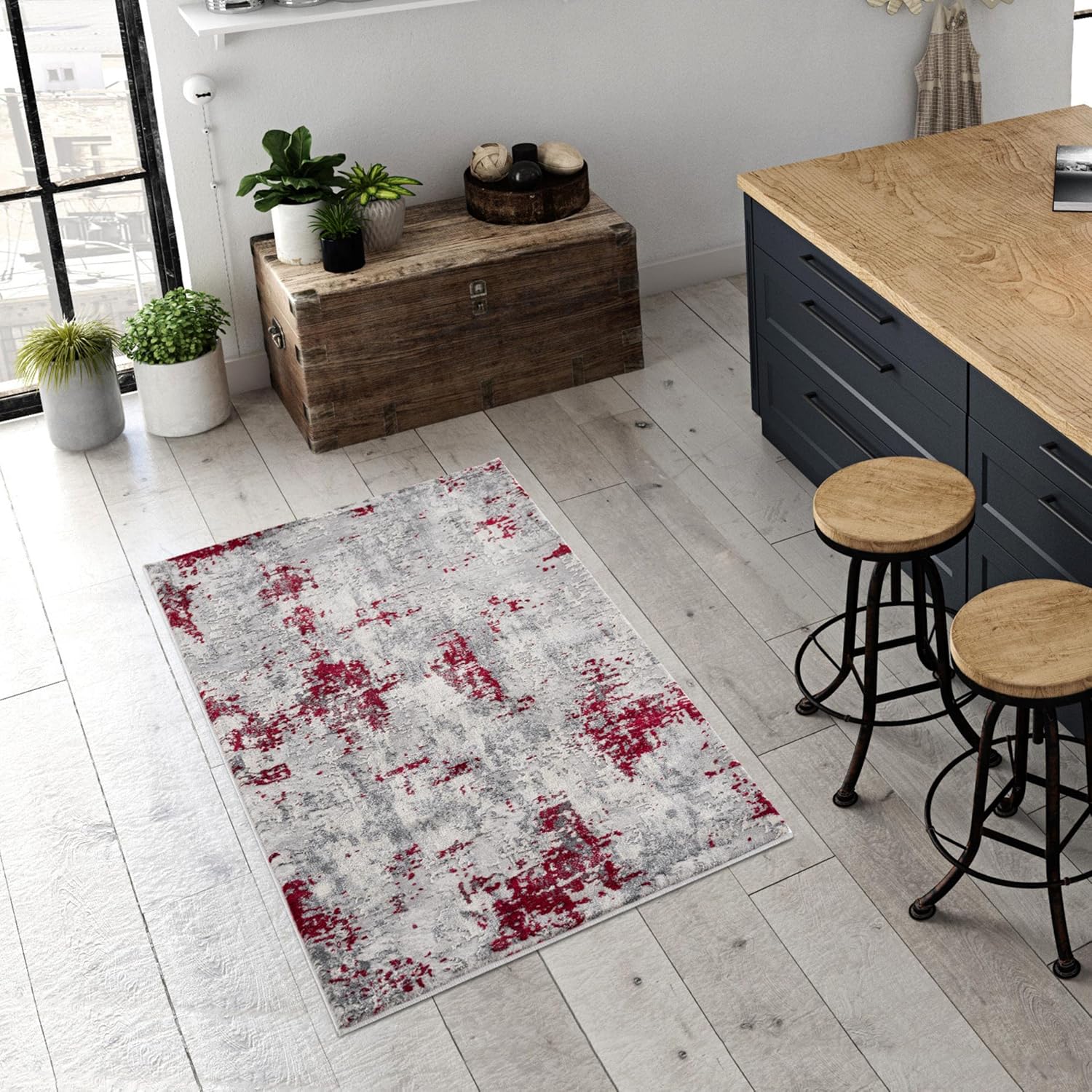 Modern kitchen with abstract red and gray rug