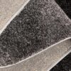 Folded gray carpet with textured backside
