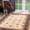 Elegant floral rug in living room with chair.