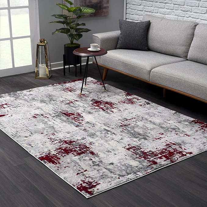 Modern living room with abstract rug design.