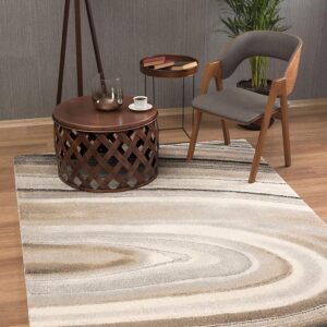 Modern living room with rug, chair, and lamp.