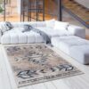 Modern living room with patterned area rug.