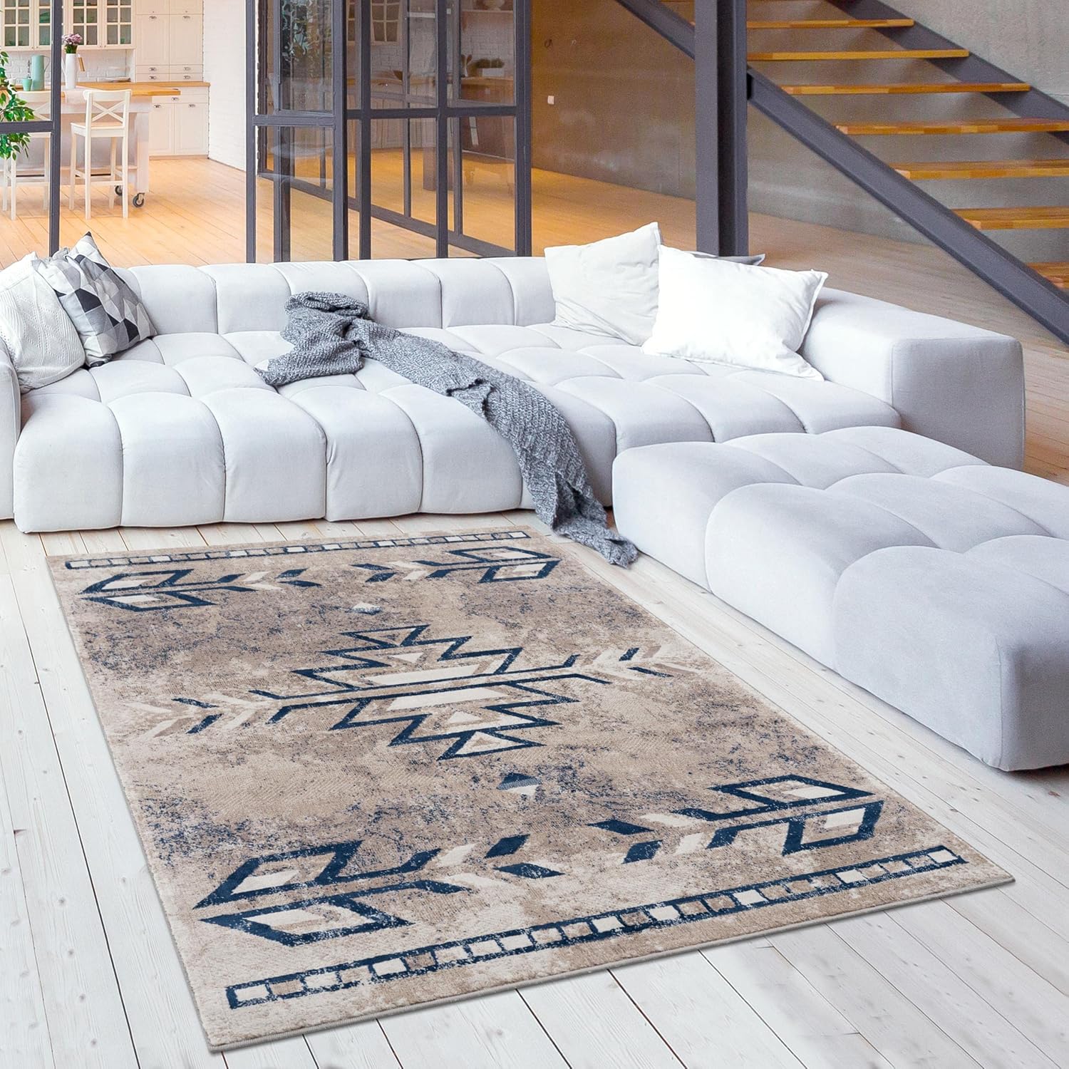 Modern living room with patterned area rug.