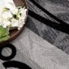 Open book with flowers on decorative tray