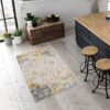 Modern kitchen with abstract rug and wooden stools.