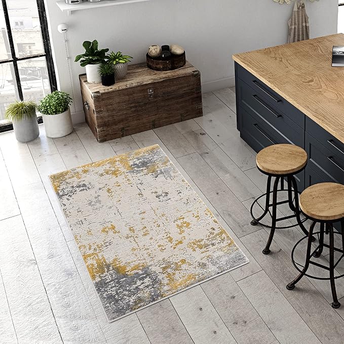 Modern kitchen with abstract rug and wooden stools.