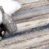 Textured carpet with decorative silver bottles.