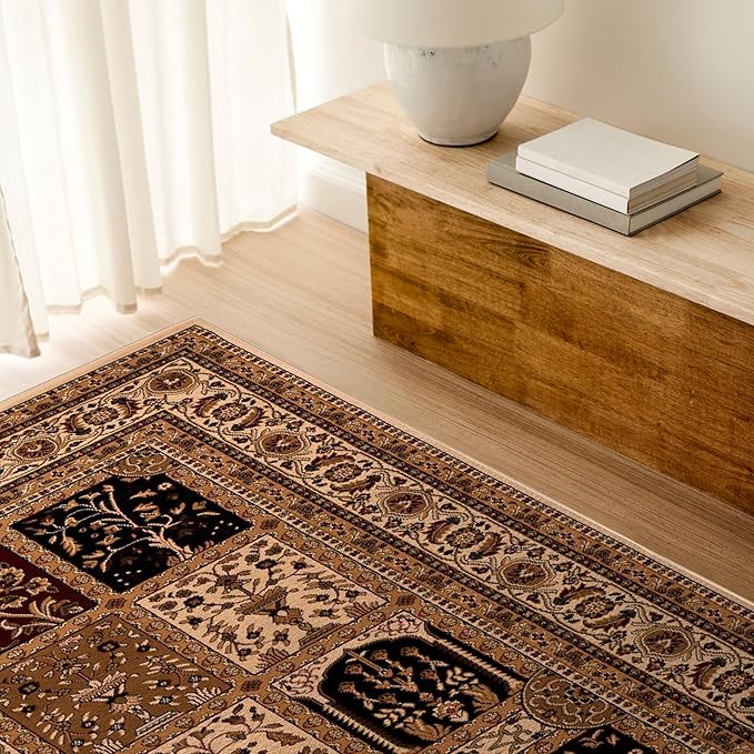 Ornate rug on wooden floor with bench and book.