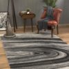 Elegant living room with gray patterned rug.