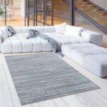 Modern living room with large white sectional sofa.