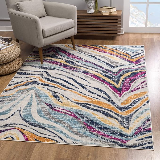 Colorful abstract area rug in modern living room.
