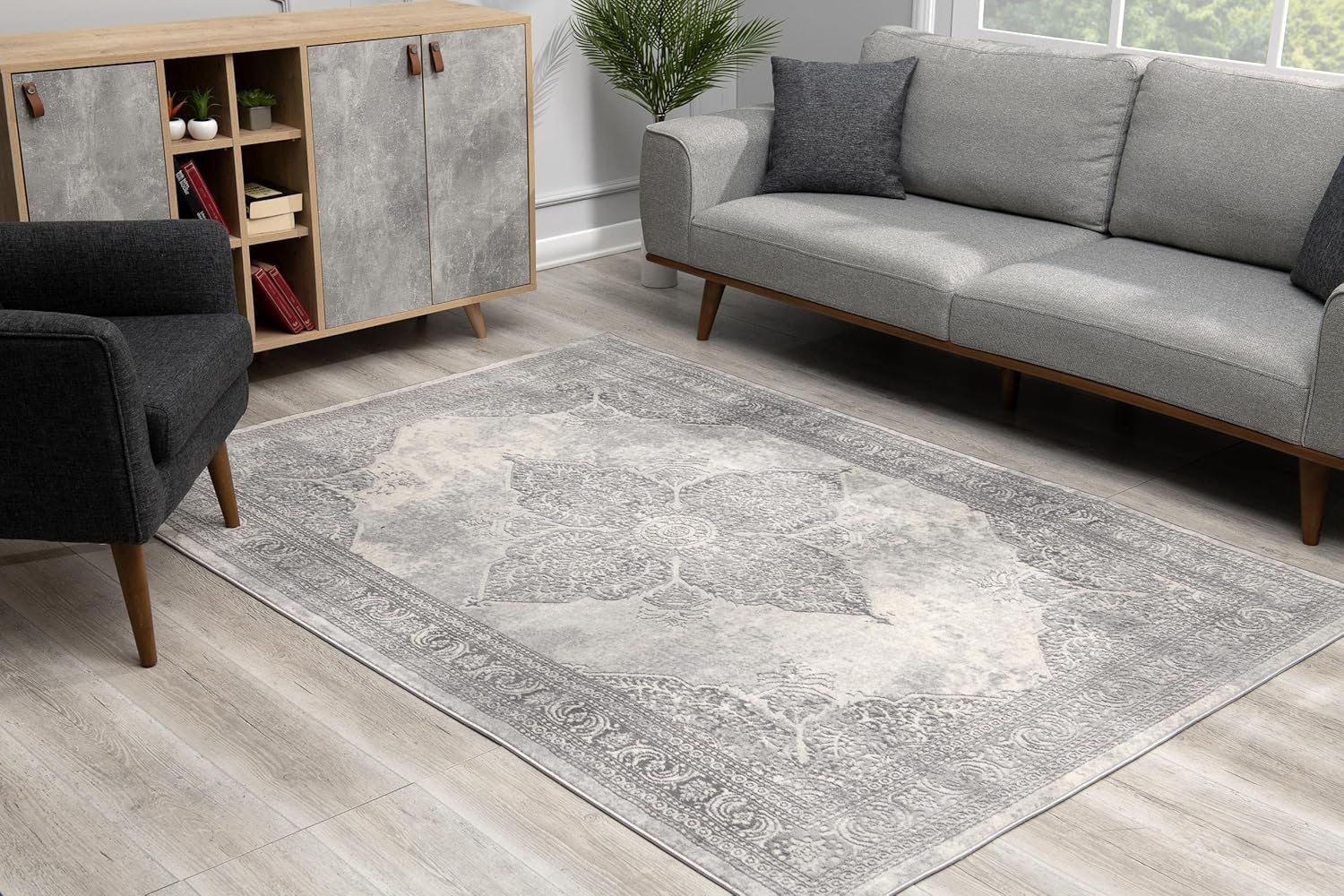 Gray rug in modern living room setting.