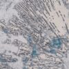 Abstract gray and blue textured pattern carpet.