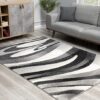 Modern living room with abstract patterned rug.
