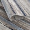 Textured blue and beige patterned floor rug