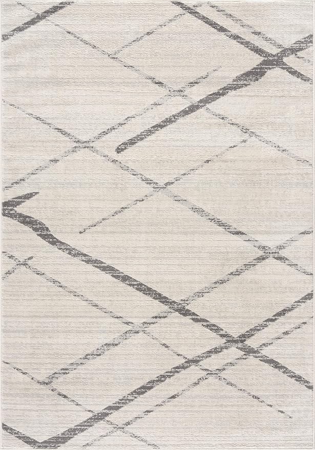 Abstract crisscross pattern on beige area rug.