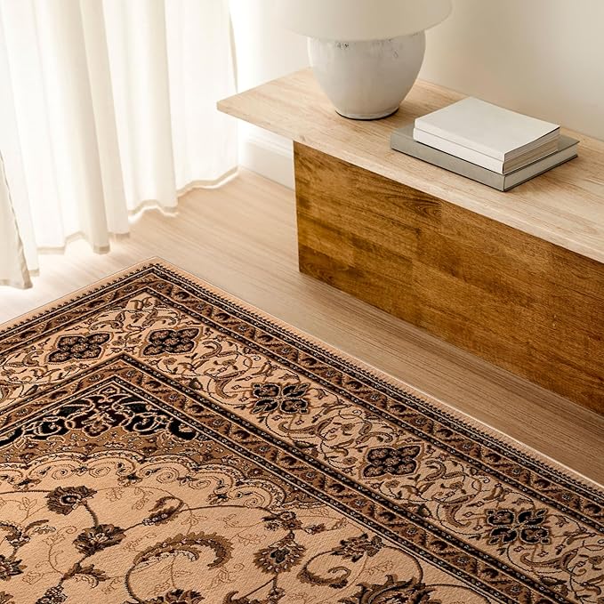 Ornate carpet beside wooden table with lamp.
