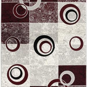 Geometric area rug with circular patterns and squares.