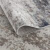 Close-up of textured area rug corner
