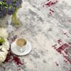 Coffee on floral-patterned carpet with flowers