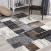 Modern geometric patterned rug in living room