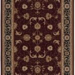 Intricate floral patterned rug with ornate border