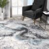 Elegant abstract rug in modern living room decor.
