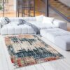 Modern living room with abstract rug and white sofa.