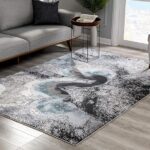 Modern abstract rug in stylish living room decor.