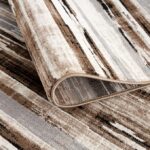Brown and white striped area rug detail